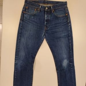 Levis 501's in a dark wash. 32W